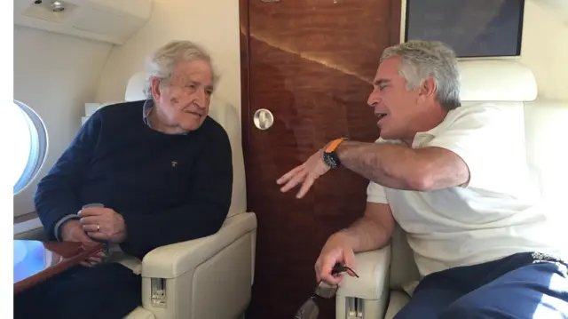 Epstein sitting alongside renowned linguist Noam Chomsky on what appears to be an aircraft