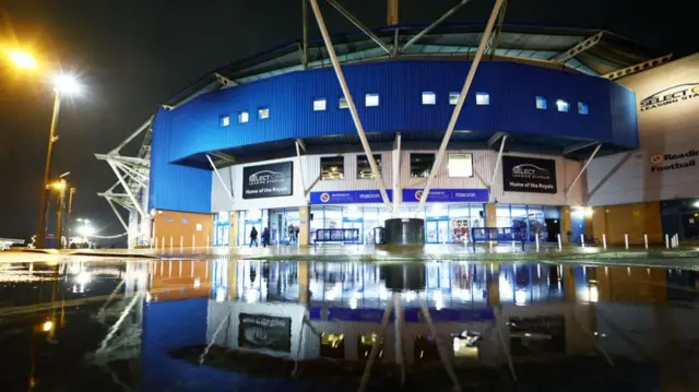 Heavy rainfall in the car park outside the Select Car Leasing Stadium