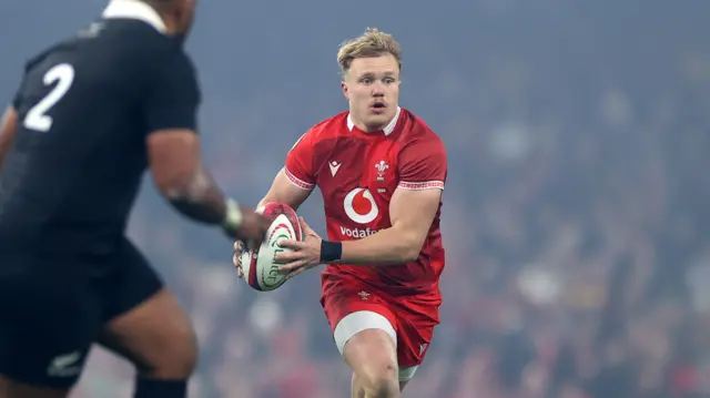 Blair Murray runs with the ball for Wales against New Zealand