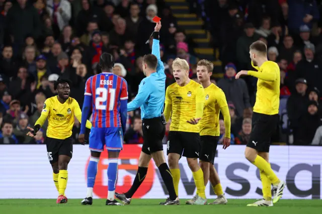LONDOClinton Antwi of KuPS Kuopio is shown a red card by referee Yigal Frid during the UEFA Conference League 2025/26 League Phase MD6 match between Crystal Palace FC and KuPS Kuopio at Selhurst Park.
