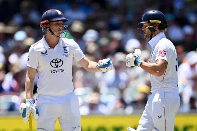 Harry Brook and Ben Stokes punch gloves