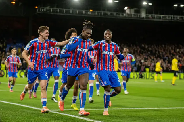 Christantus Uche of Crystal Palace celebrate with Jaydee Canvot, Justin Devenny after scoring opening goal during the UEFA Conference League 2025/26 League Phase MD6 match between Crystal Palace FC and KuPS Kuopio at Selhurst Park.