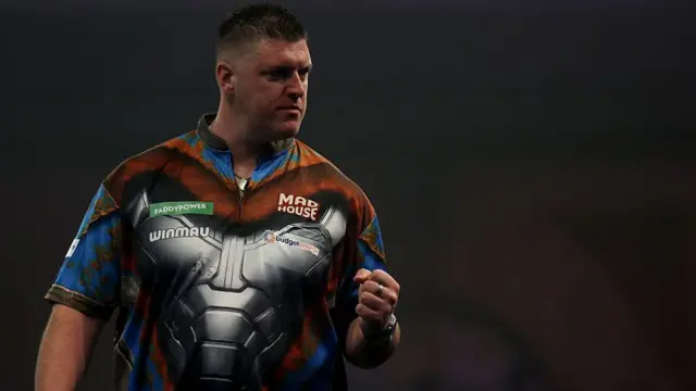 Daryl Gurney celebrates