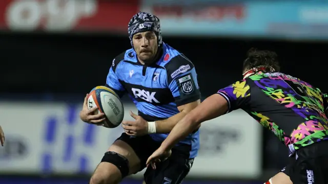 Alun Lawrence carries the ball for Cardiff against Lions