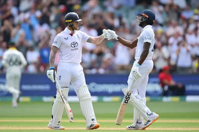Ben Stokes and Jofra Archer punch gloves