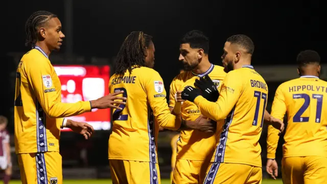 Wimbledon celebrate Marcus Browne's equaliser