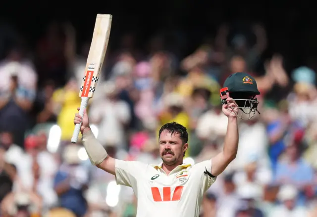 Australia's Travis Head celebrates after reaching his century