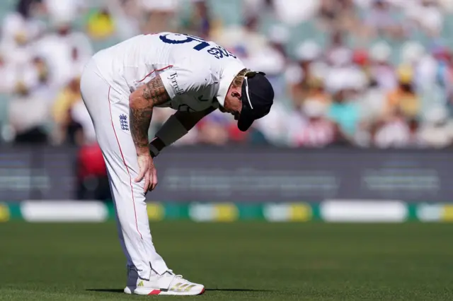 England’s Ben Stokes stretches on day three of the third NRMA Insurance Ashes Series 2025 test at the Adelaide Oval, Australia