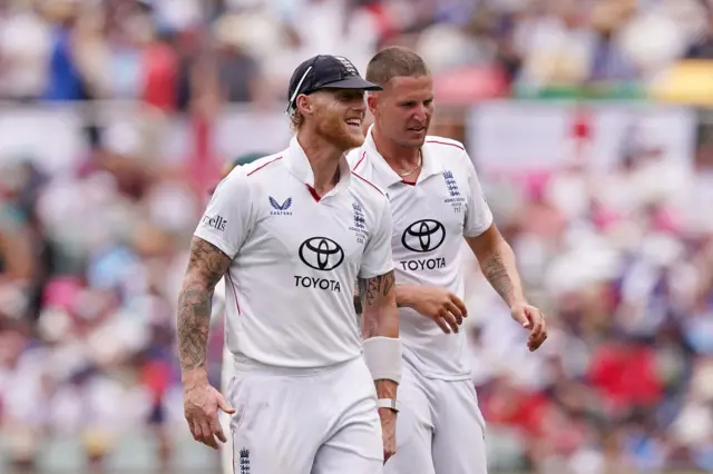 Brydon Carse and Ben Stokes