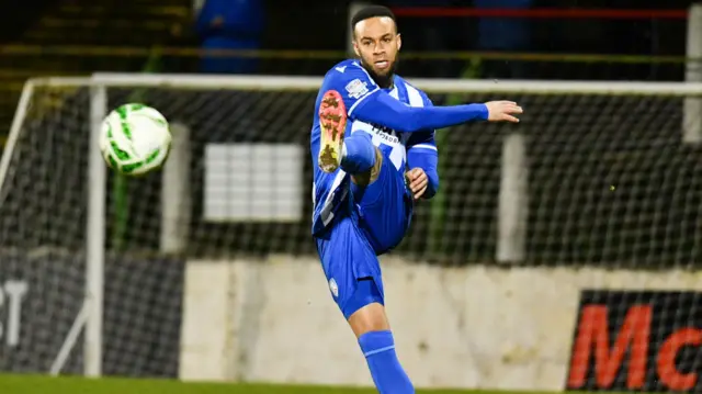 Action from Glentoran v Coleraine