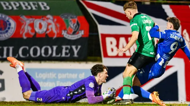 Action from Glentoran v Coleraine
