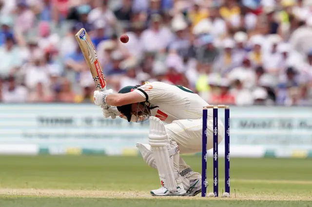 Australia's Travis Head ducks under a short delivery on day three of the third NRMA Insurance Ashes Series 2025 test at the Adelaide Oval, Australia