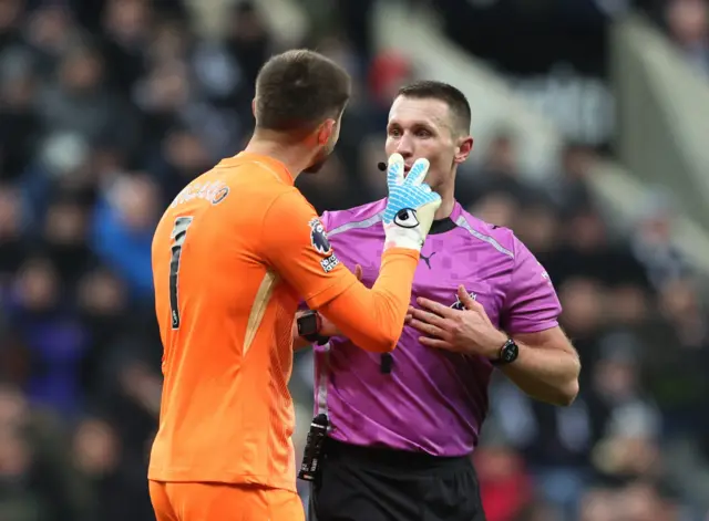Guglielmo Vicario speaks to the referee