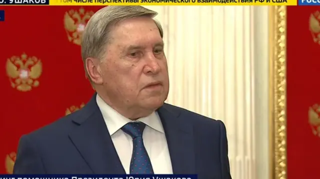 A man in a blue suit