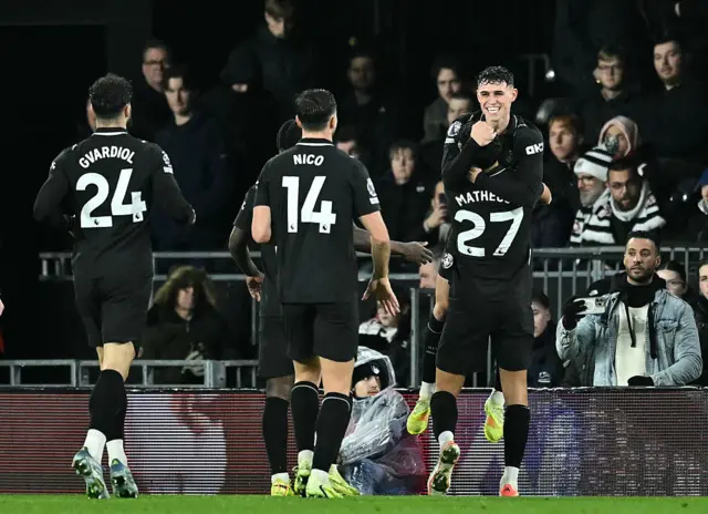 Phil Foden celebrates with his teammates