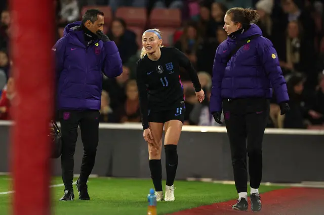 England's striker #11 Chloe Kelly leaves the game having picked up an injury during the women's International football friendly match between England and Ghana at St Mary's Stadium in Southampton, southern England on December 2, 2025.