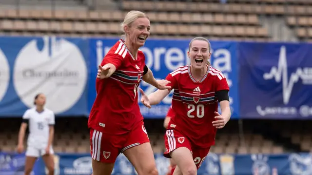 Sophie Ingle celebrates with Carrie Jones