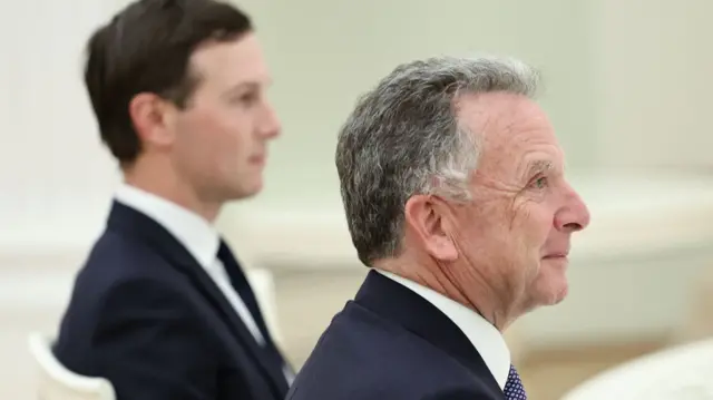 Side profile of Witkoff and Kushner sitting at the table in the Kremin