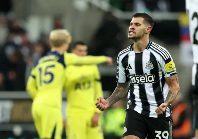 Bruno Guimaraes celebrates