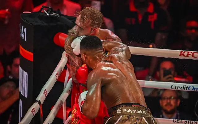 Anthony Joshua lands a punch on Jake Pauls chin