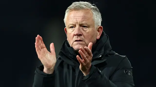 Sheffield United boss Chris Wilder applauding supporters