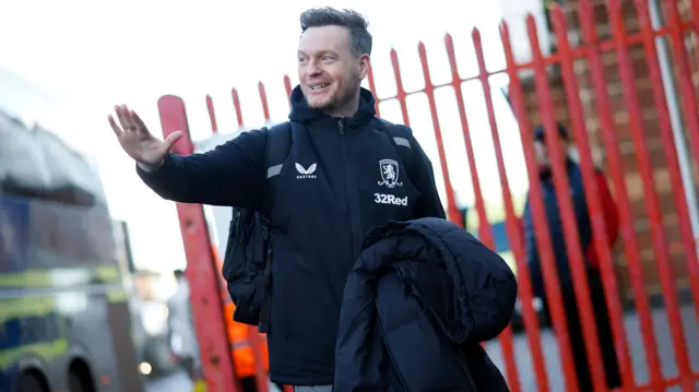 Middlesbrough boss Kim Hellberg waves as he arrives at Ashton Gate