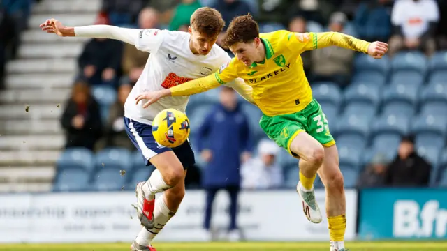 Preston North End's Harrison Armstrong (left) and Norwich City's Kellen Fisher battle for the ball