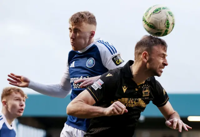 Matthew Fitzpatrick heads the ball