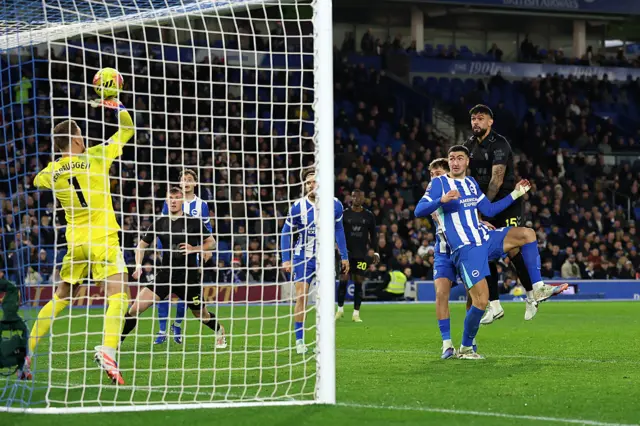 Bart Verbruggen of Brighton & Hove Albion saves a header from Omar Alderete of Sunderland