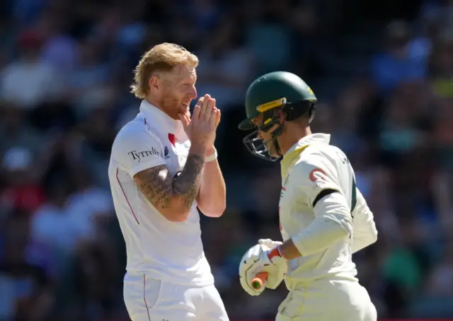England's Ben Stokes reacts after bowling to Australia's Alex Carey