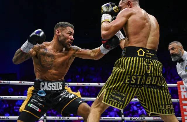 Troy Williamson punches Callum Simpson