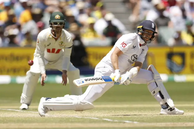 Joe Root reverse sweeps for four