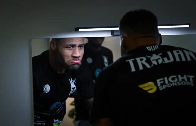 Troy Williamson looks in the mirror