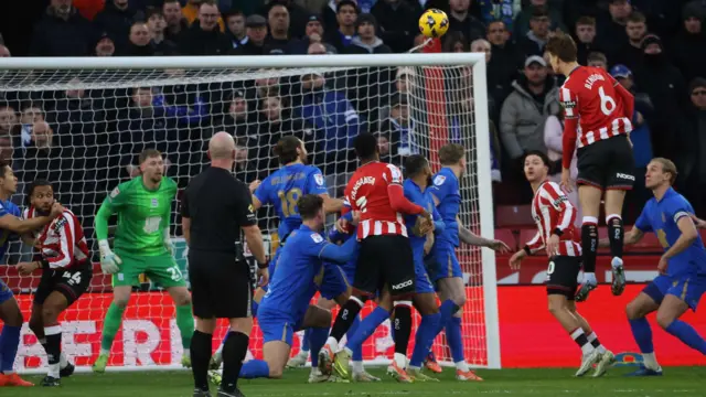 Tyler Bindon rises to score for Sheffield United