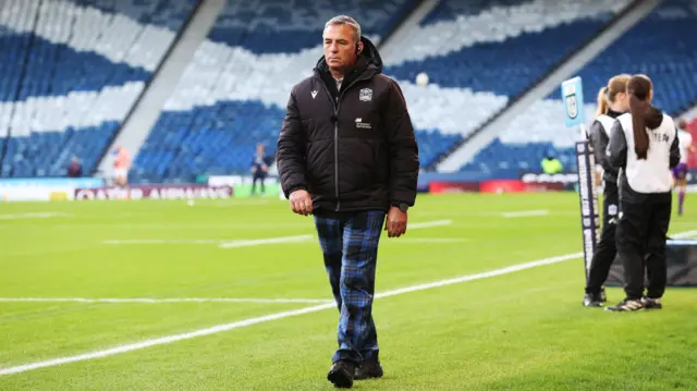 Franco Smith in blue tartan trews