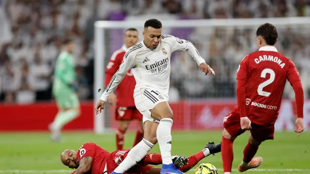 Sevilla's Brazilian defender #23 Marcao Teixeira, Real Madrid's French forward #10 Kylian Mbappe