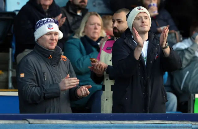 Bolton fans clap their team