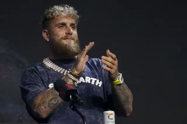 Jake Paul claps his hands