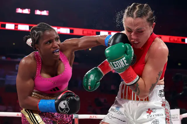 Caroline Dubois lands a punch on Camilla Panetta