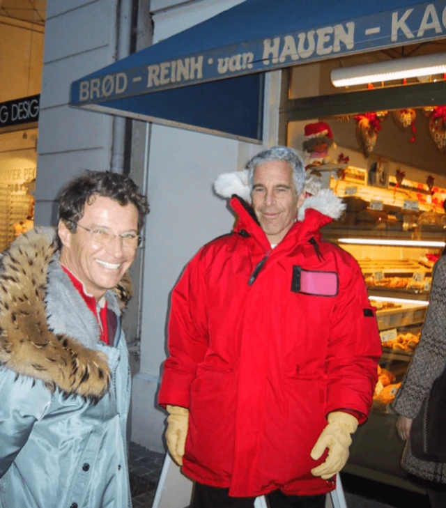 French modelling agent Jean Luc Brunel poses for a photo next to Jeffrey Esptein outside a Danish baker