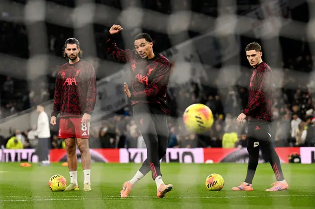 Hugo Ekitike of Liverpool warms up with shooting drill