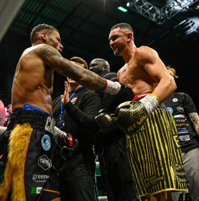 Troy Williamson and Callum Simpson embrace