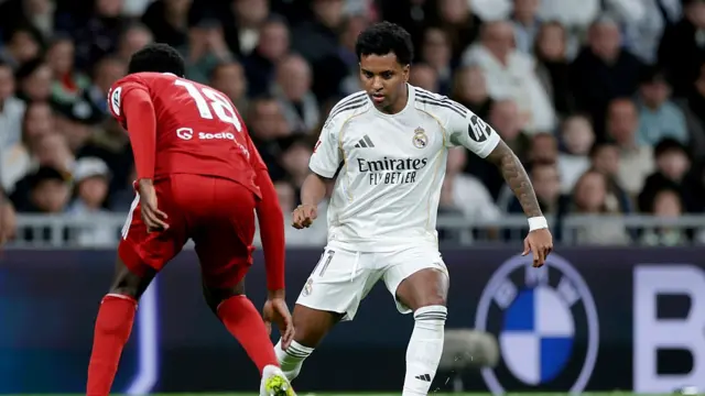 Lucien Agoume of Sevilla, Rodrygo of Real Madrid