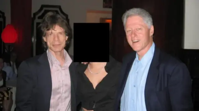 Former US president Bill Clinton (R) and Mick Jagger pictured here with a woman whose face has been redacted