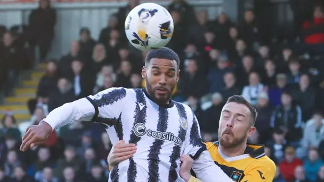 St Mirren's Jonah Ayunga and Livingston's Danny Wilson