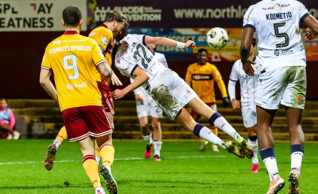 Callum Slattery heads in the winning goal for Motherwell