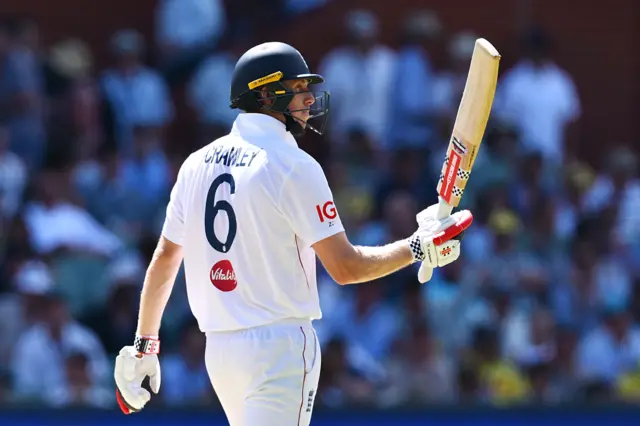 Zak Crawley celebrates his half-century
