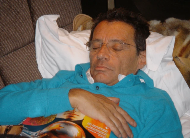 Another image shows Brunel asleep while clutching a magazine