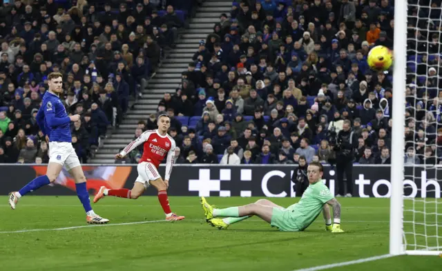 Arsenal's Leandro Trossard shoots at goal and hits the post during Premier League fixture Everton v Arsenal.