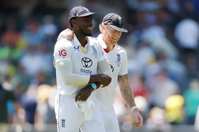Jofra Archer and Ben Stokes celebrate the wicket of Scott Boland
